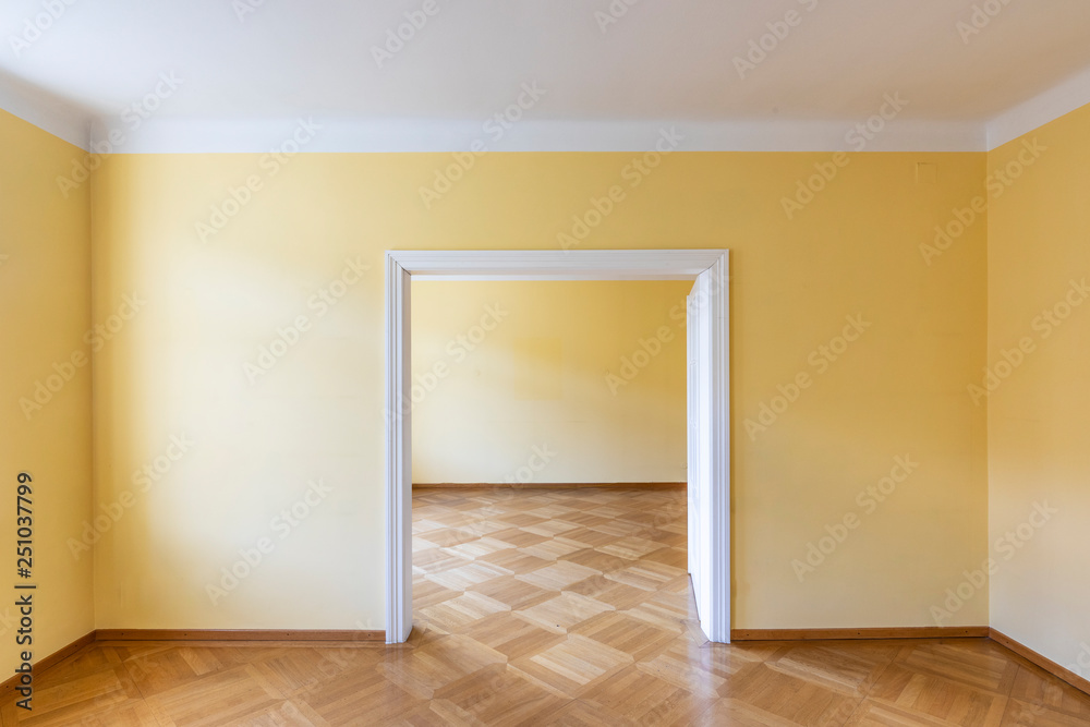 empty dining or dancing room of an old vintage house with wooden parket empty dining or dancing room of an old vintage house with wooden parket