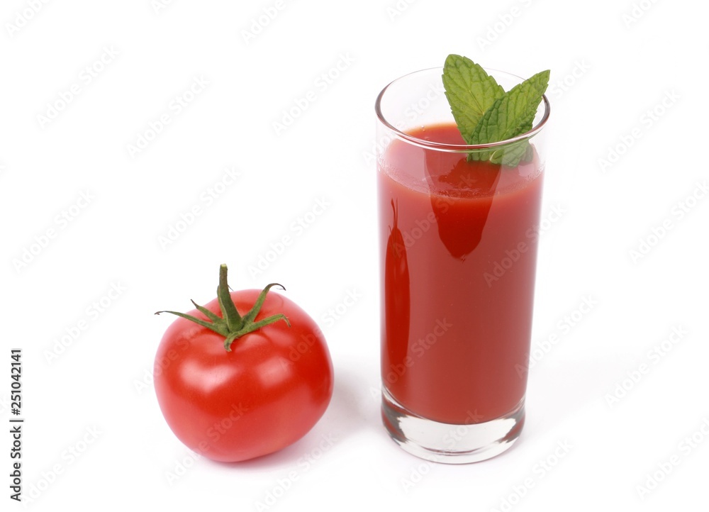 fresh tomato juice - glass with fresh tomato juice and a fresh tomato isolated on white fresh tomato juice - glass with fresh tomato juice and a fresh tomato isolated on white