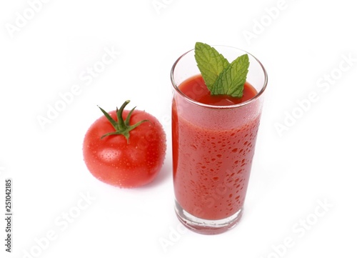 Wallpaper Mural Tasty tomato juice and tomato's - glass with fresh tomato juice and a fresh tomato with drops of water isolated on white Torontodigital.ca