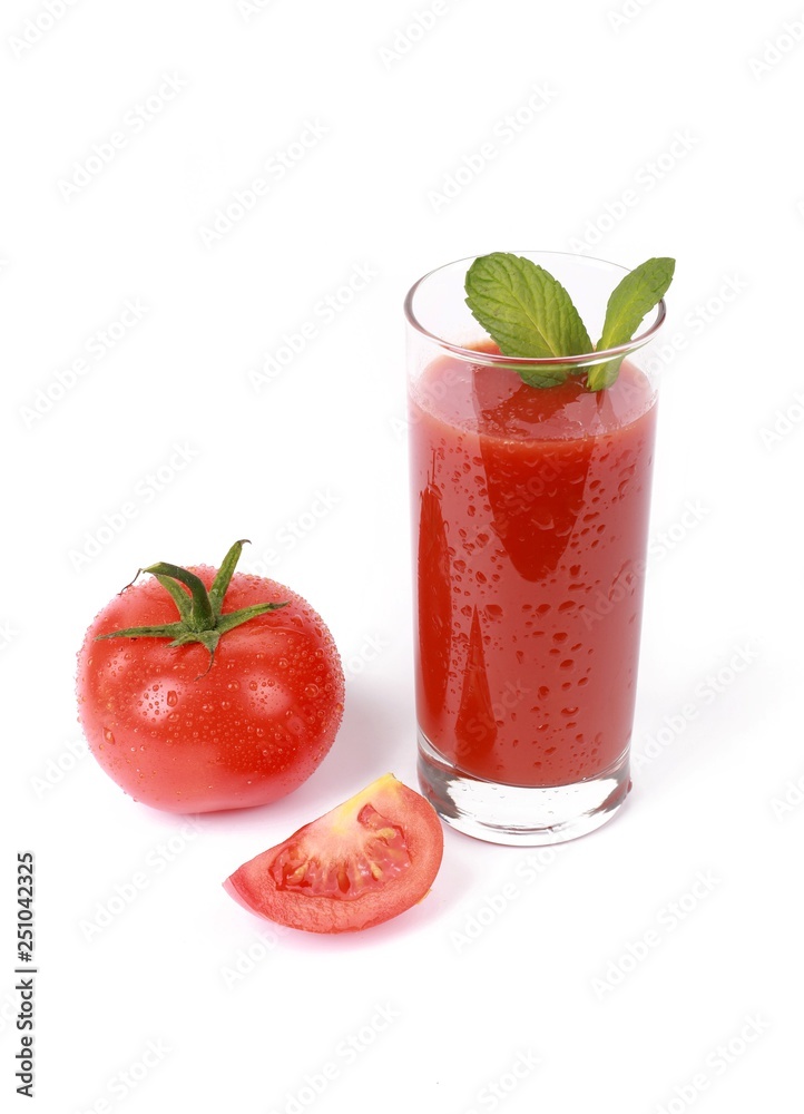 fresh tomato juice - glass with fresh tomato juice and a fresh tomato with drops of water isolated on white fresh tomato juice - glass with fresh tomato juice and a fresh tomato with drops of water isolated on white
