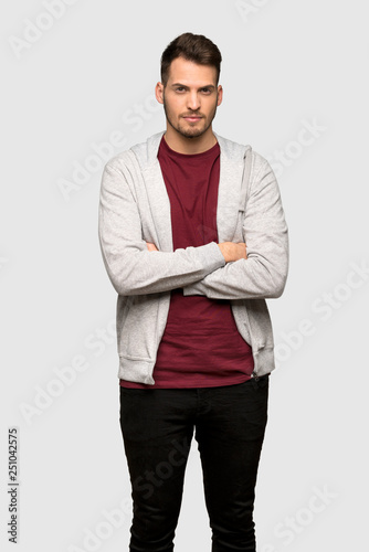 Man with sweatshirt portrait over grey background