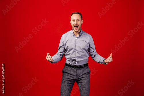man man fighting over red background. business, anger and people concept