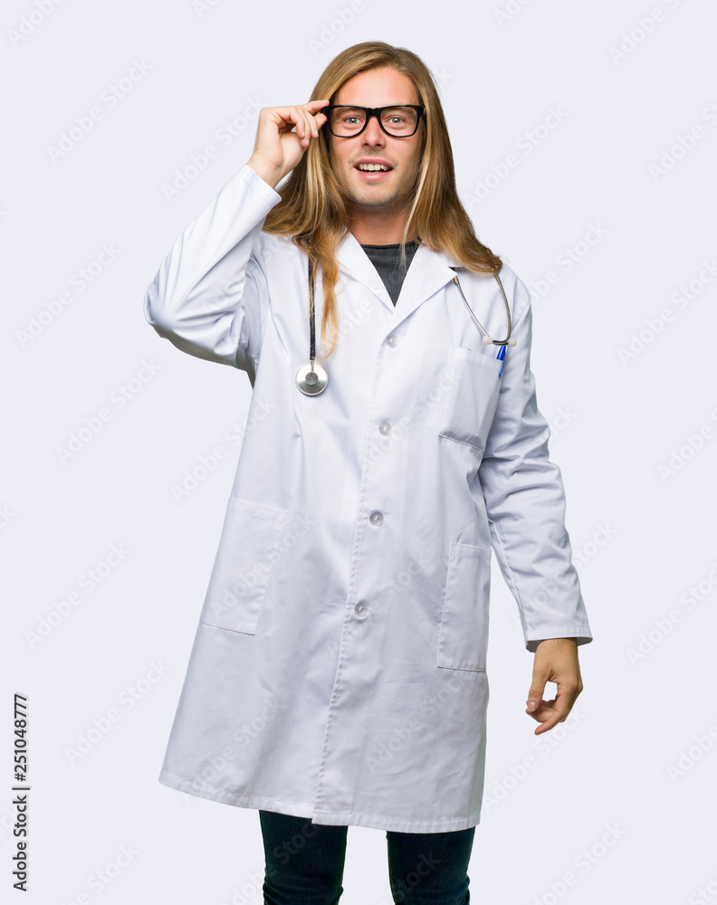 Doctor man with glasses and surprised on isolated background Doctor man with glasses and surprised on isolated background