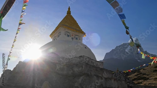 Himalaya, Nepal. A stupa on the track to the Everest Base Camp shining in the sun rays. UHD 4K