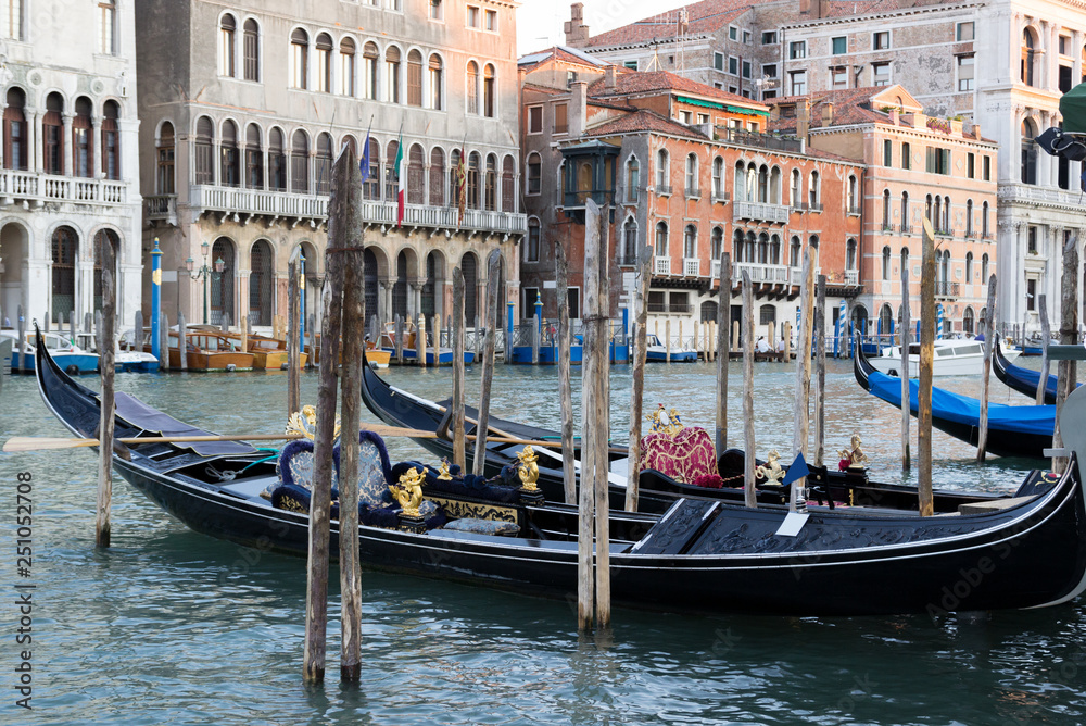Venetian gondolas on venetian canal