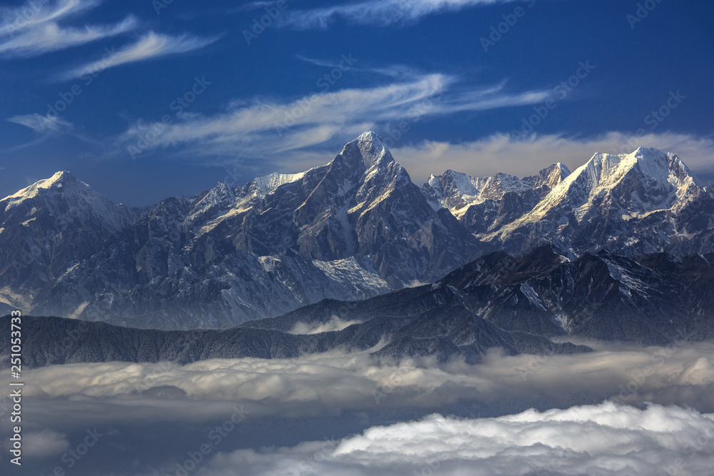 custom made wallpaper toronto digitalEdge of the Himalayas - view from Niubeishan Cattle Back Mountain in Sichuan Province, China. View on Clear day above the sea of clouds, blue sky. Himalayan snow capped high altitude mountains