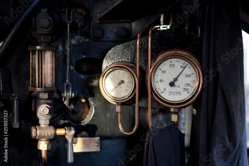 Pressure gauge in engine room of old steam train