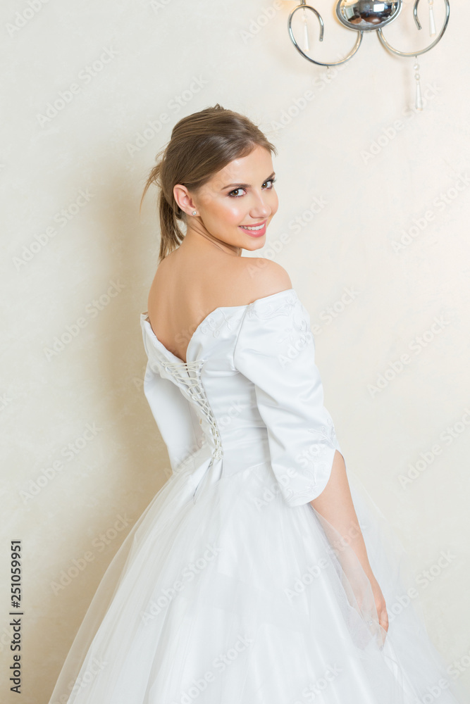 Beautiful young bride in white wedding dress Beautiful young bride in white wedding dress