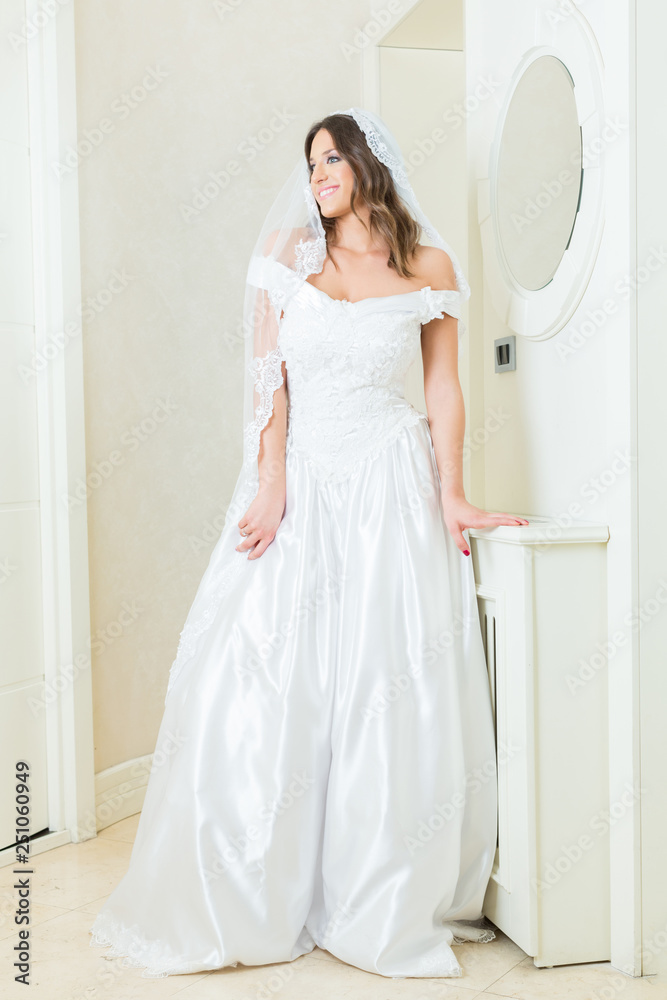 Beautiful young bride in white wedding dress Beautiful young bride in white wedding dress