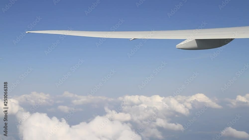 Flying with an airplane high above the clouds Flying with an airplane high above the clouds
