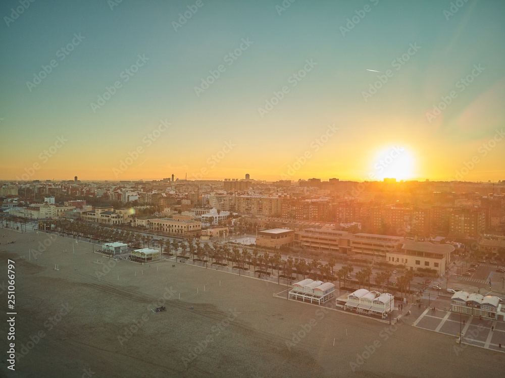 Aerial view of the skyline at sunset from the Malvarrosa beach in Valencia. Spain