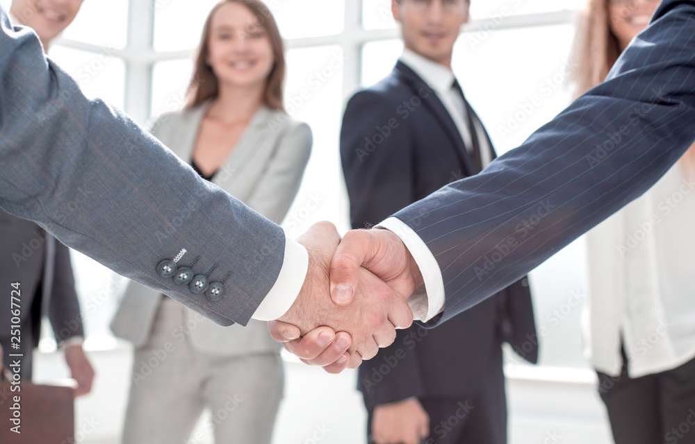 close up.handshake business partners in the office. close up.handshake business partners in the office.