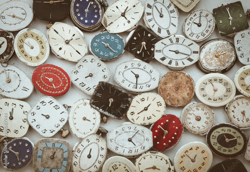 Old fashioned retro little wrist watch rusty dials with hands top view backgroung Old fashioned retro little wrist watch rusty dials with hands top view backgroung