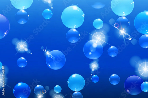 bubbles with reflections on a blue background, under water