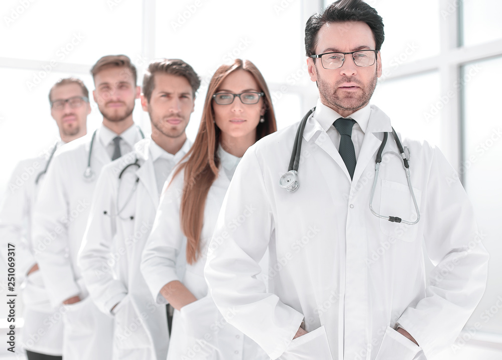 portrait of doctors standing in a row in the hospital portrait of doctors standing in a row in the hospital