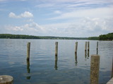 Multiple wooden posts in the lake