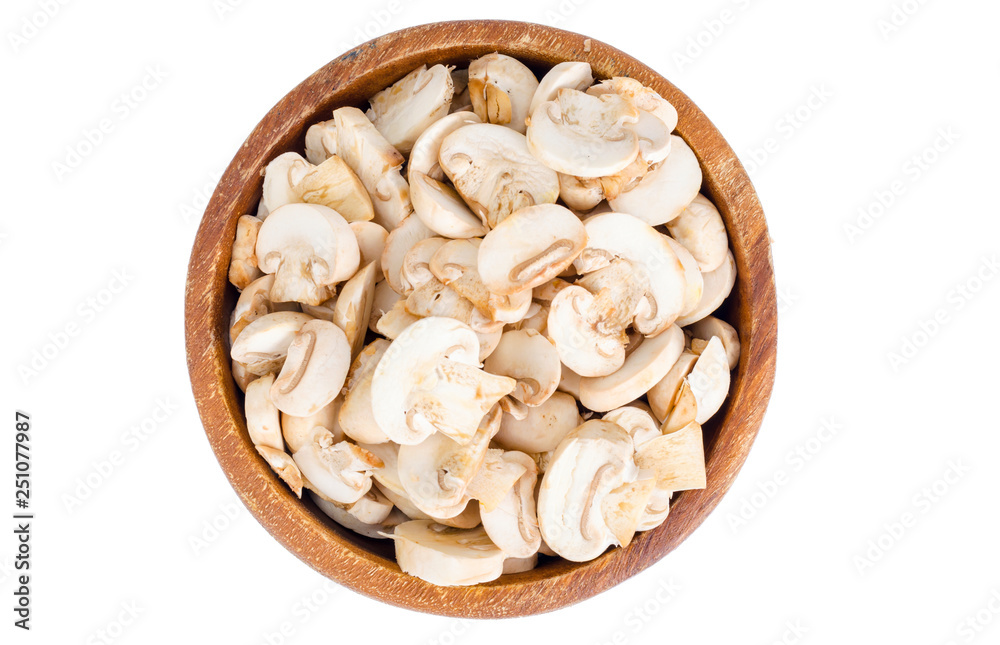 Sliced fresh white champignons for cooking. Sliced fresh white champignons for cooking.