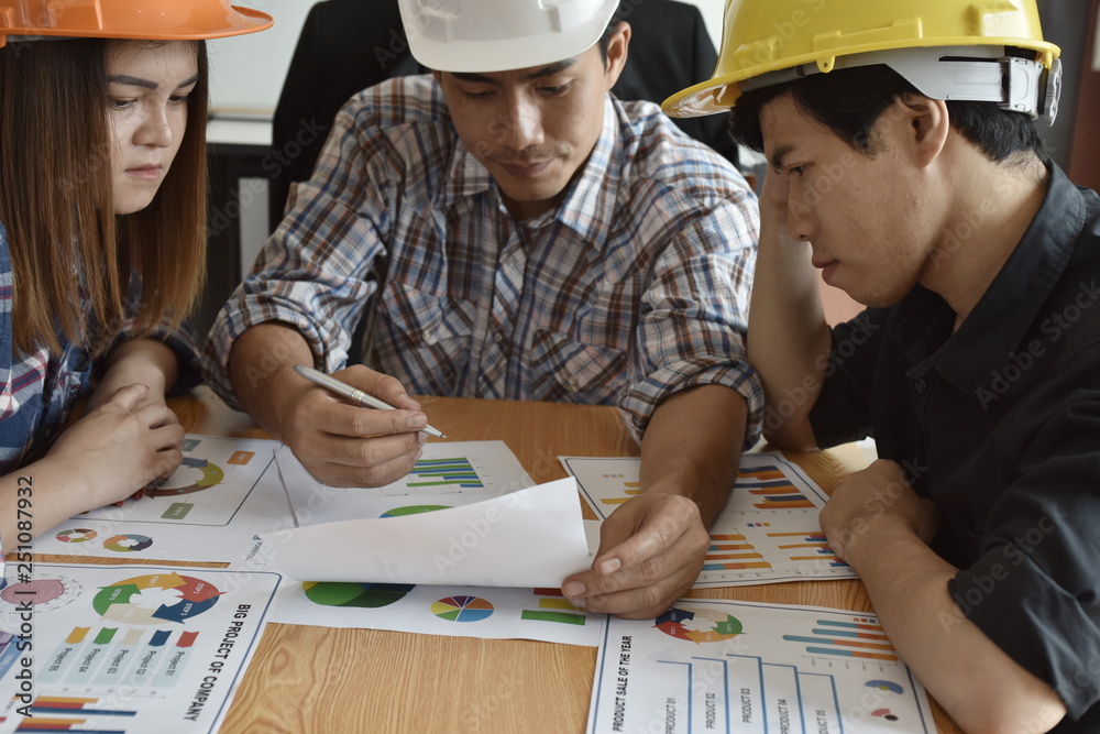 Design engineers meeting planning Civil Engineer and Mechanic Group