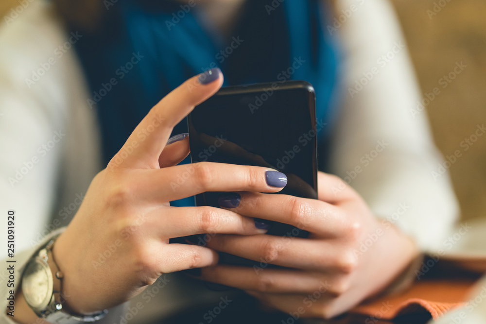 Close Up on Woman's hand holding Smart Phone mobile text message internet browsing connection app