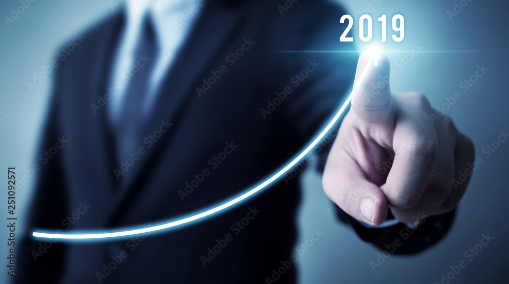 Business development to success in 2019 concept. Businessman pointing arrow graph corporate future growth plan Business development to success in 2019 concept. Businessman pointing arrow graph corporate future growth plan