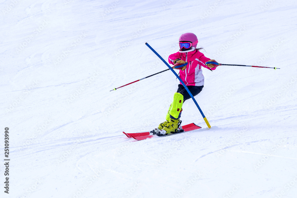 People are enjoying downhill skiing and snowboarding	