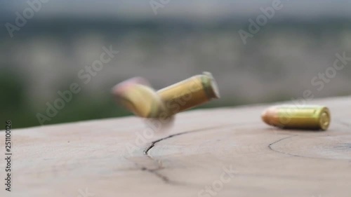 Bullets falling in slow motion