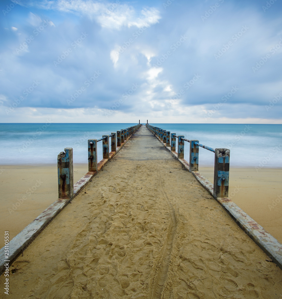 Boardwalk on beach at sunrise . Awana Kijal, Kemaman. Malaysia. 