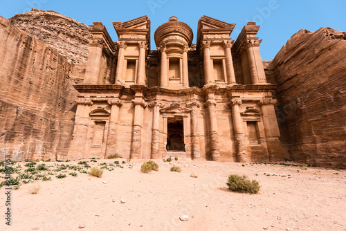 The stunning view of Ad Deir, the Monastery of Petra, Jordan on a clean blue sky winter day