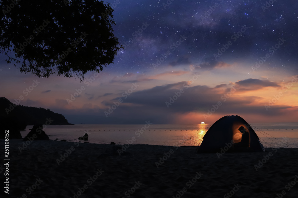 Camping on the beach with million stars galaxy