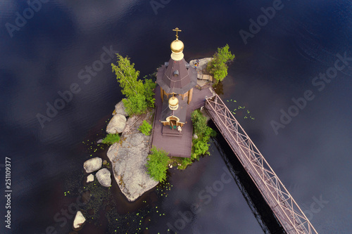 Top view of the Church of the Apostle Andrew the First-Called on the Vuoksa River. (aerial photography). Leningrad region, Russia photo