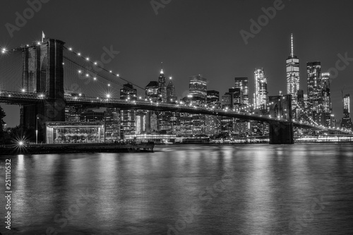 brooklyn bridge at night in black and white