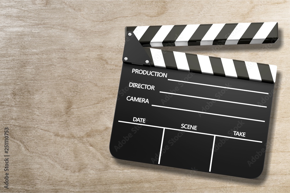 Obraz premium Clap board on wooden background