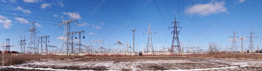 Panoramic image of winter high voltage substation.