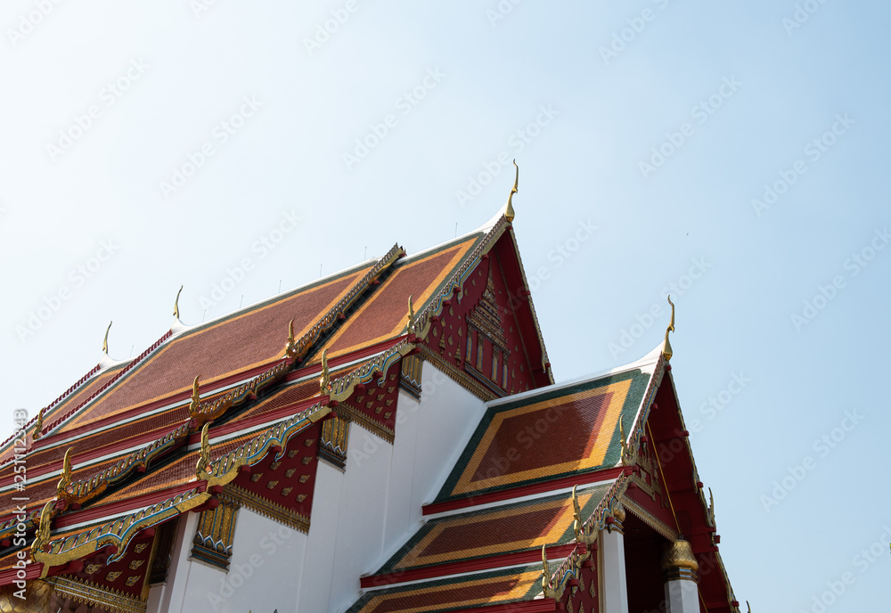 temple roof with against blue sky in Thianland. temple roof with against blue sky in Thianland.