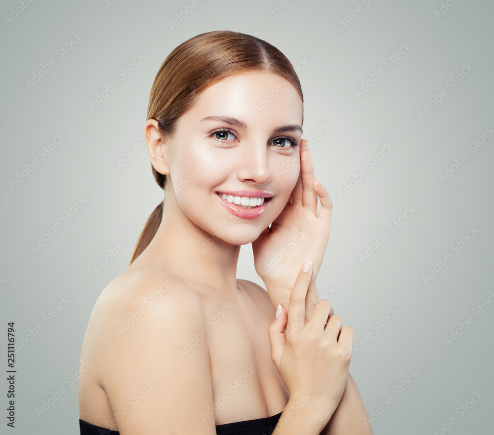 Happy girl portrait. Young woman face with clear skin and natural makeup  smiling Stock Photo | Adobe Stock