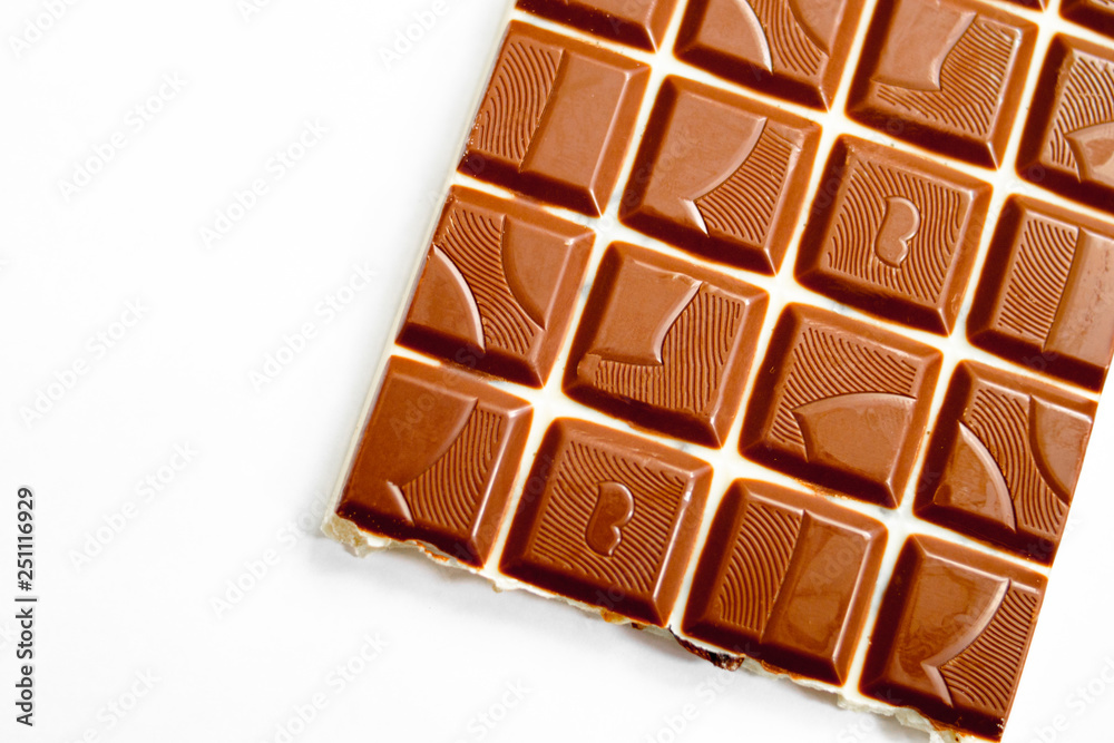 Obraz premium milk chocolate bar on white background