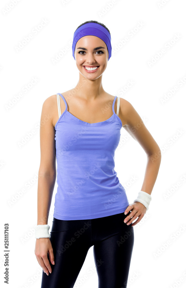 smiling sporty brunette woman in violet sportswear, isolated smiling sporty brunette woman in violet sportswear, isolated