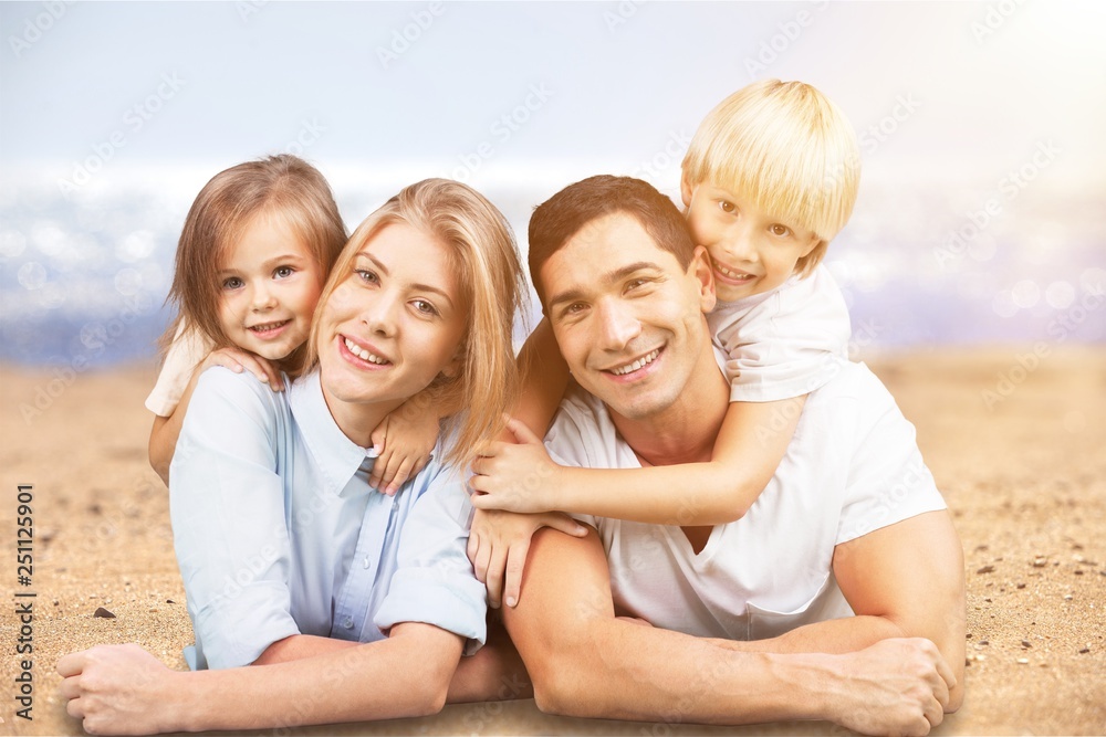 Beautiful smiling Lovely family on background Beautiful smiling Lovely family on background