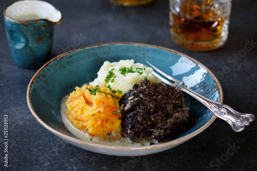 Scottish dish of haggis, neeps and tatties, meal served traditionaly on Burns night photo