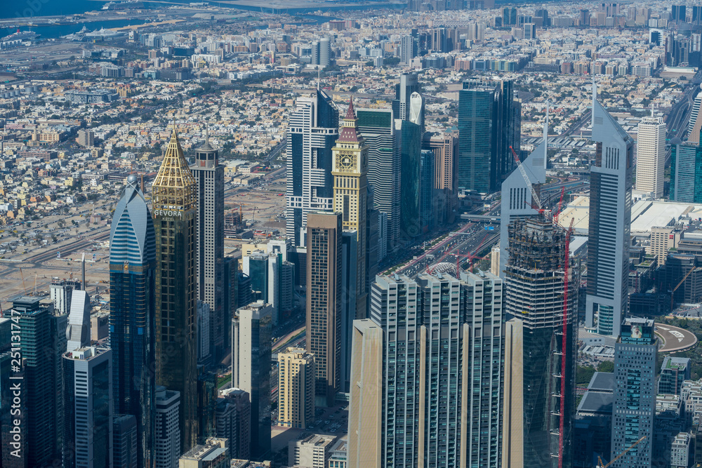 Fototapeta premium Bird view of Dubai skyline at daytime