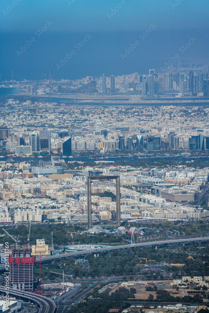 Bird view of Dubai skyline and Dubai Frame at daytime