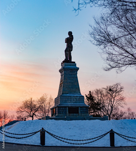 Monument to count Muraviev of the Amur near the Cliff in Khabarovsk, Russia, at sunset.