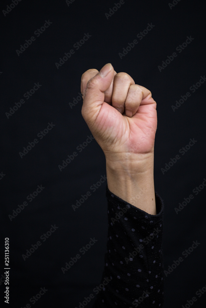 An woman protests and defend s her rights with her hands. An woman protests and defend s her rights with her hands.