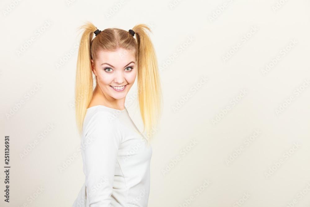 Happy blonde teenager girl with ponytails Happy blonde teenager girl with ponytails