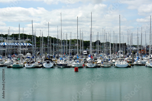 Boats, masts, clouds.Marina in the port of Howth.Ireland. 
