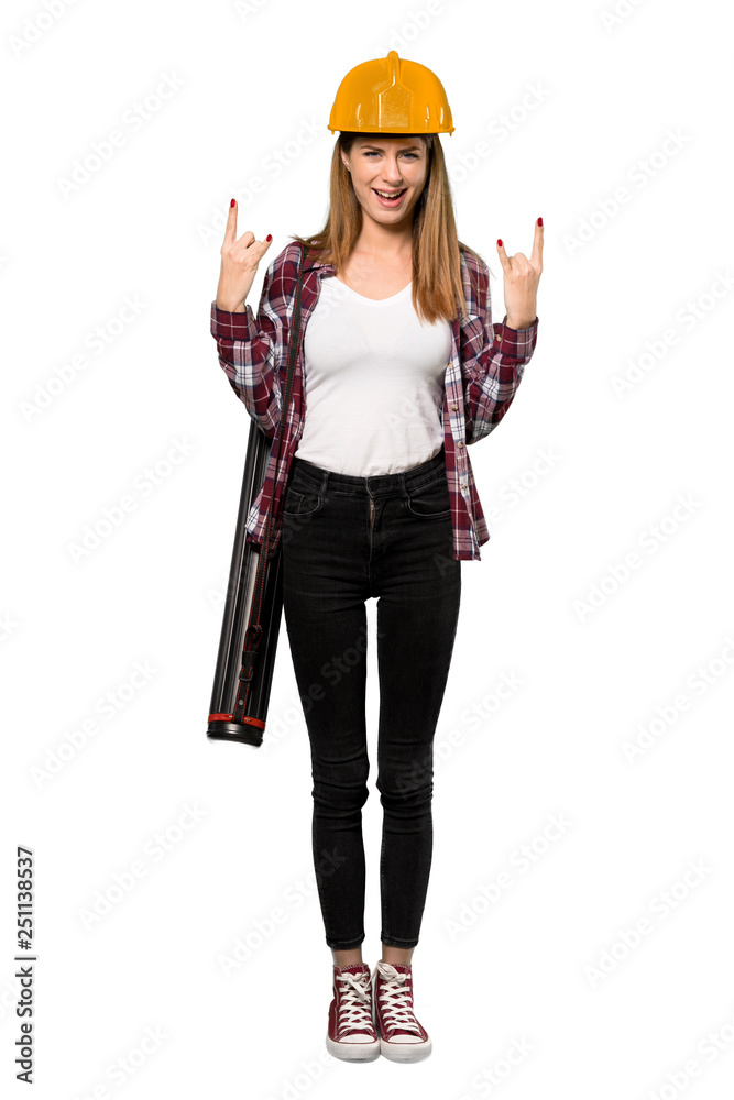 A full-length shot of a Architect woman making rock gesture over isolated white background A full-length shot of a Architect woman making rock gesture over isolated white background