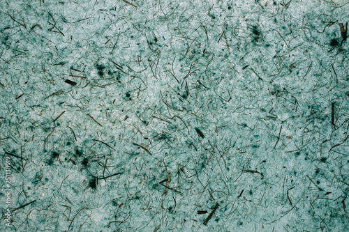 Abstract turquoise texture made with recycled paper. 