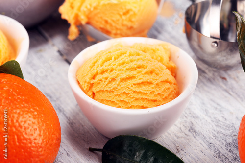 scoop of tangarine orange ice cream. delicious icecream set