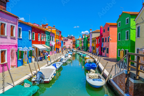 Canal and colorful buildings in Burano island, Venice, Italy 