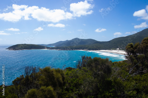 beautiful Australian landscape with mountains huge beach and blue ocean © Candice